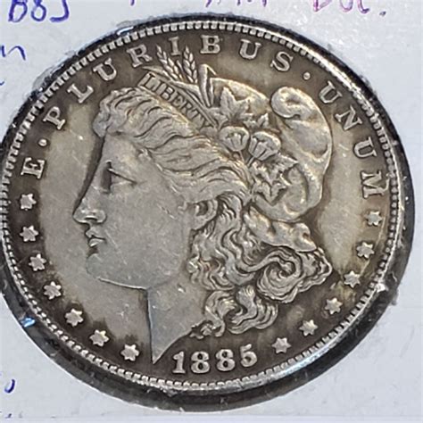 1885 MORGAN SILVER DOLLAR - Big Valley Auction