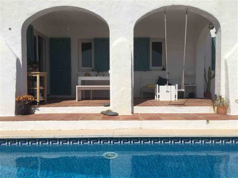 Typical Menorcan house with a swimming pool and ocean view - Villas for ...