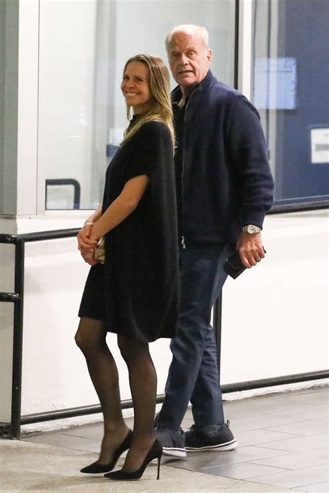 Kelsey Grammer, 69, packs on the PDA with wife Kayte Walsh, 45