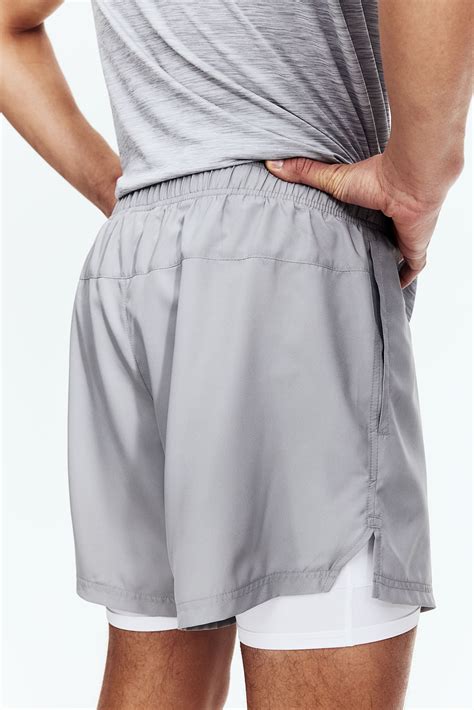 Double-layered sports shorts with DryMove™ - Grey - Men | H&M IN