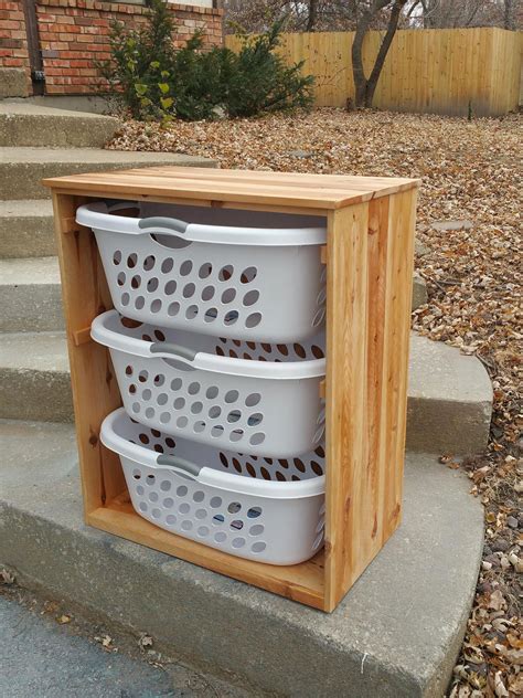 Maximizing Your Space With A Laundry Basket Cabinet - Home Cabinets