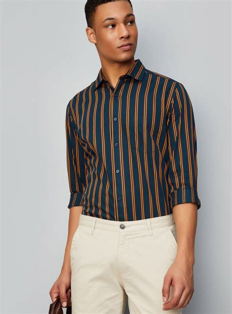 Buy Men Regular Fit Striped Shirt Online at just Rs. 999.0 ...