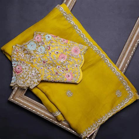Yellow Organza Saree with Heavy Embroidery work and Unstitch