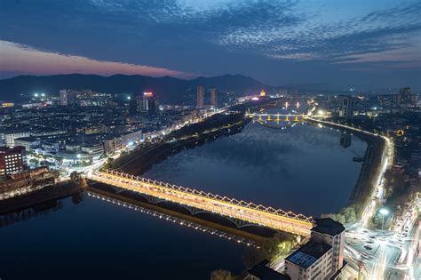 中国河南省信阳市城市夜景的4K延时摄影视频素材_ID:VCG42N1369551692-VCG.COM