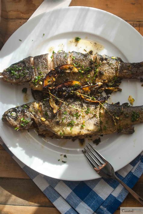 Pan fried rainbow trout recipe with herb and garlic butter – Artofit