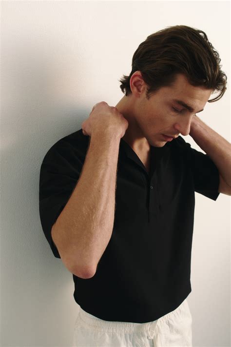Loose Fit Polo shirt - Black - Men | H&M IN