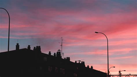 Wallpaper dusk, moon, building, silhouette hd, picture, image