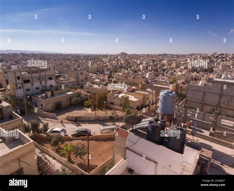 Rooftop water tanks are a common sight in the arid, sprawling city of ...