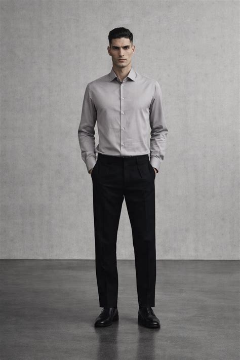 Which are the solid shirt designs available in Tarrit collection like