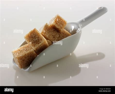 Brown Demerara Sugar cubes Stock Photo - Alamy