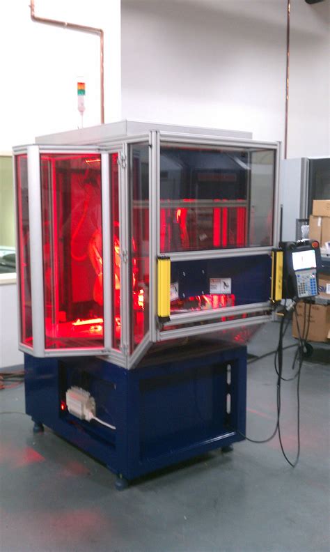 Image result for Automated Assembly Cell with Robot