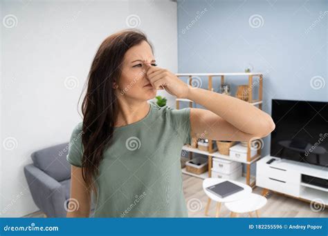 Woman Covering Her Nose from Bad Smell Stock Photo - Image of ...
