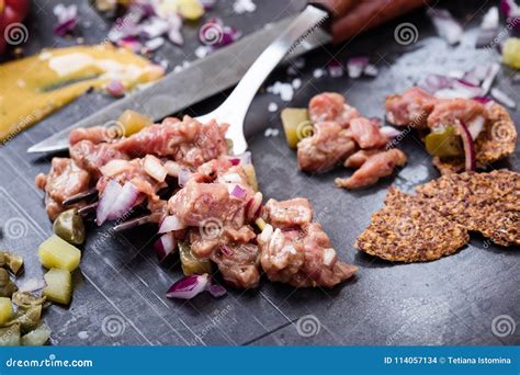 Steak Tartare Preparation. Raw Ground Beef Dish Stock Photo - Image of ...