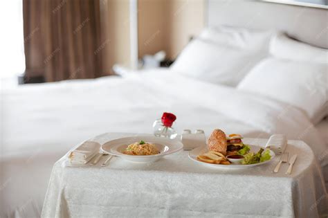 Premium Photo | Room service food meal delivery in luxury hotel room ...