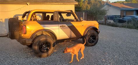 Mud flaps are ugly, so I went another direction with vinyl wrap ...