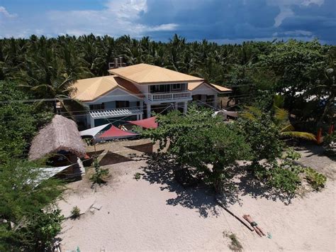 Cozea Beach Lodge Maniwaya - AC room (4pax) - Villas for Rent in ...