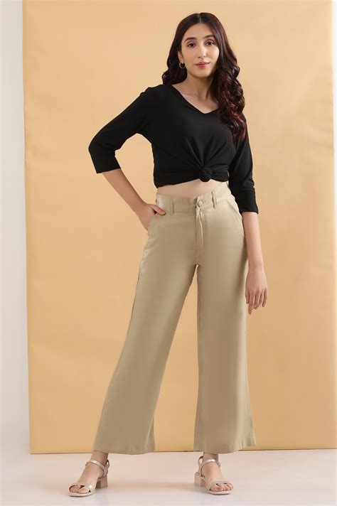 Buy Elleven Women's Gold Solid Straight Fit Woven Pants With ...