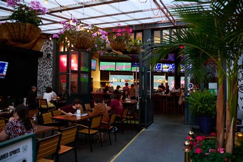 Untamed Spirits | Urban Sports Bar with Lush Patio & Industrial Charm ...