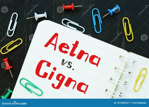 The Image Contains the Inscription Aetna Vs. Cigna on a Notepad Sheet ...