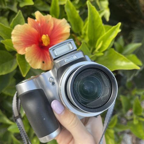 The Kodak EasyShare Z740 is a versatile and reliable... - Depop