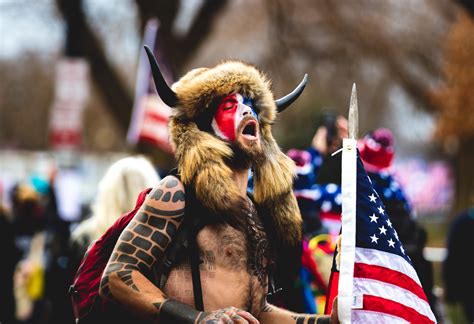 Qanon Shaman Suing Trump