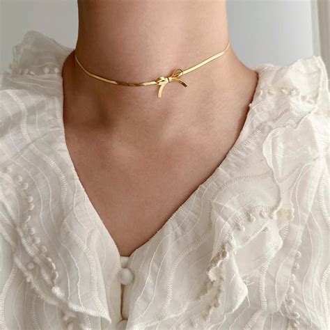 Aamara Bow Gold plated Necklace – AAMARA