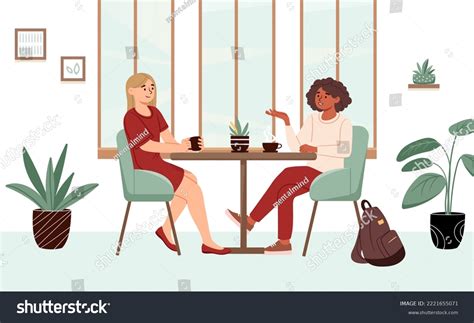 Two People At A Table