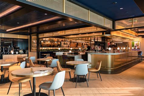 Eat breakfast, lunch and dinner in the lounge’s spacious dining area ...