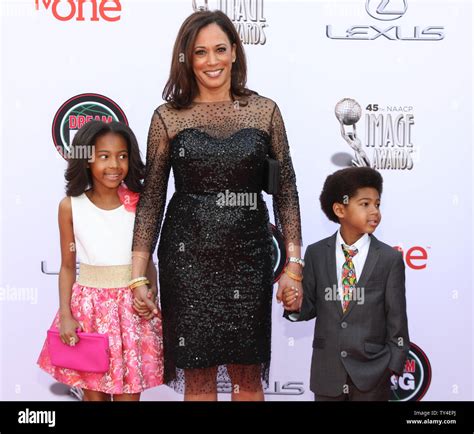 California Attorney General Kamala Harris (C) and guests arrive for the ...