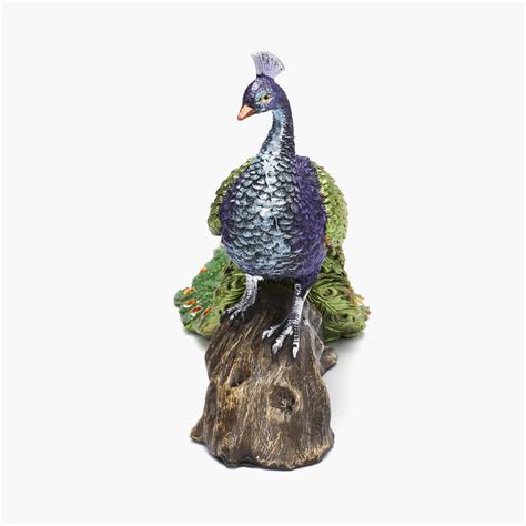 Buy Galaxy Peacock on Log from Home Centre at just INR 1799.0