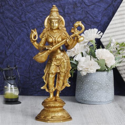 Brass Goddess Maa Saraswati Standing Vidya Devi Sculpture (Height :10 ...