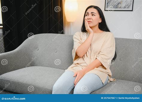 Woman with Severe Toothache Touching Her Swollen Cheek. Young Girl Feeling Discomfort after ...