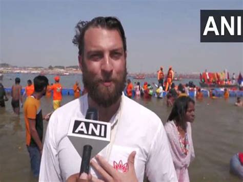 Devotee from Australia takes holy dip at Mahakumbh calls it "experience ...
