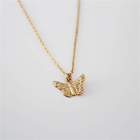 Tiny gold butterfly necklace hot sale