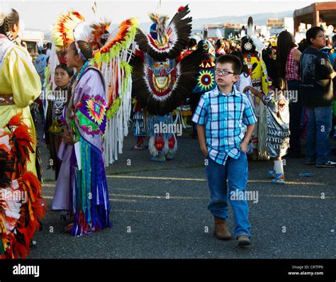 Fort Washakie, Wyoming - Young participant in a powwow checking the ...