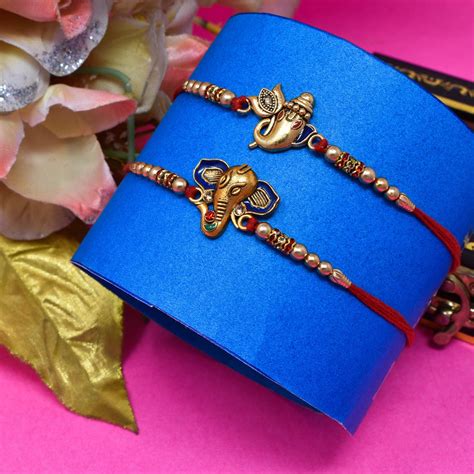 Lord Ganesha Combo Rakhi Pack of 2 with Roli Chawal n Rakshabandhan Gr ...