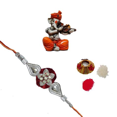 eCraftIndia Designer Single Rakhi with Lord Ganesha Playing Violin and ...