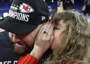 See Taylor Swift’s Peach Fuzz Nails at the Chiefs Game