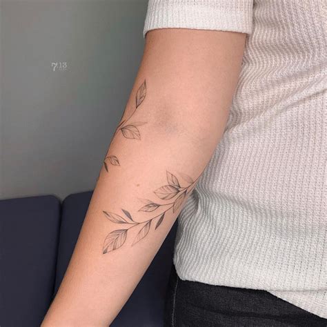 Tattoos That Wrap Around Arm - Tattoo Style Trends