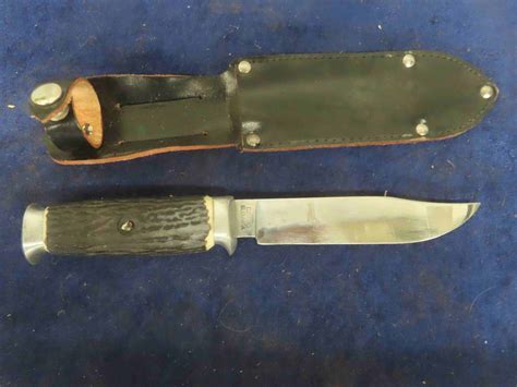 4 Hunting Knives with Sheaths