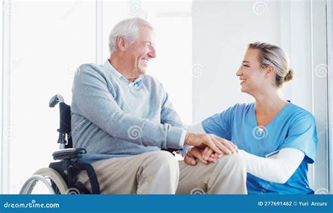 Im so Happy Youre Here. a Senior Man in a Wheelchair Being Cared for by ...