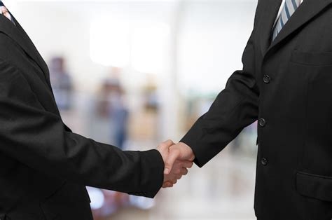 Business Handshake with Aeroplane Background Image 的图像结果