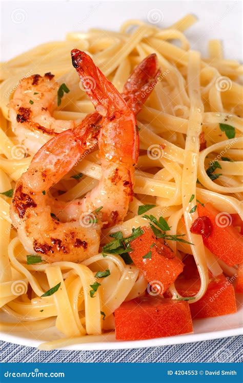 Linguini with Shrimp, Tomato and Parsley Stock Image - Image of ...