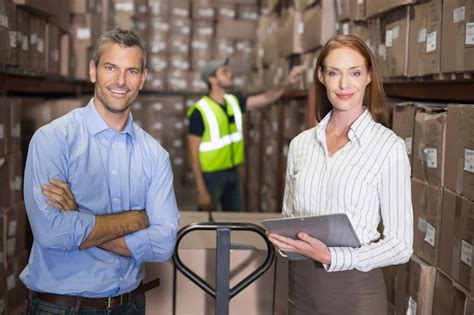 Warehouse manager and foreman working together | Premium Photo