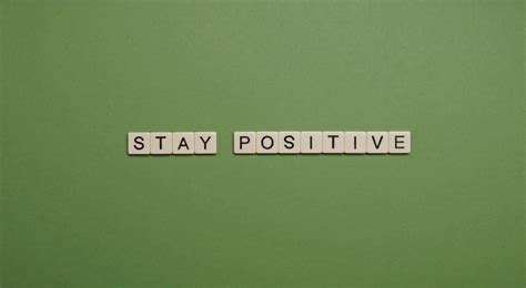 Download Stay Positive Scrabble Word On Green Background Wallpaper ...