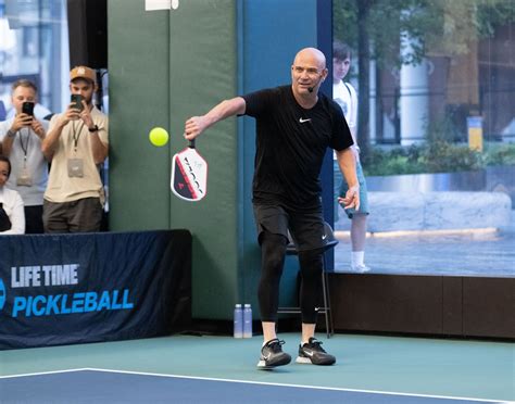 Andre Agassi sets out on tour; shoulders responsibility of popularizing ...