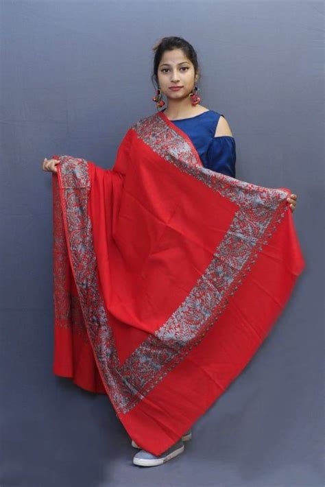Red colour wrap with grey colour aari embroidery looks beautiful