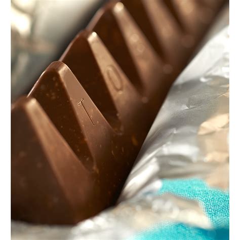 Toblerone Swiss Milk Chocolate with Honey Almond Nougat, Holiday ...