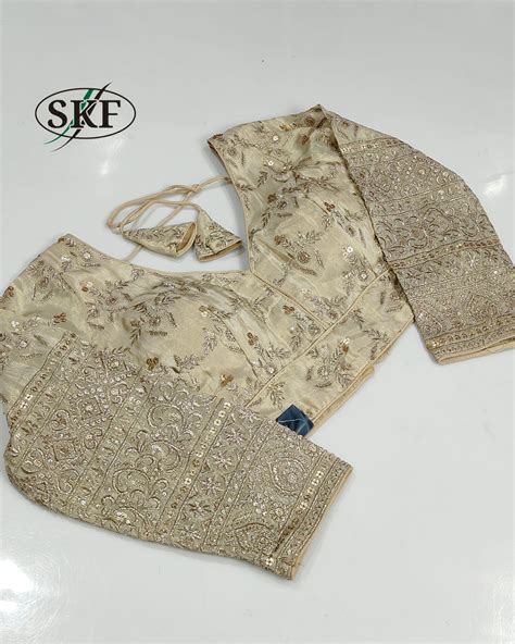 TISSUE SEQUENCE EMBROIDERY GOLDEN BEIGE BLOUSE BY SKFBHOLUBHAI – SKF ...