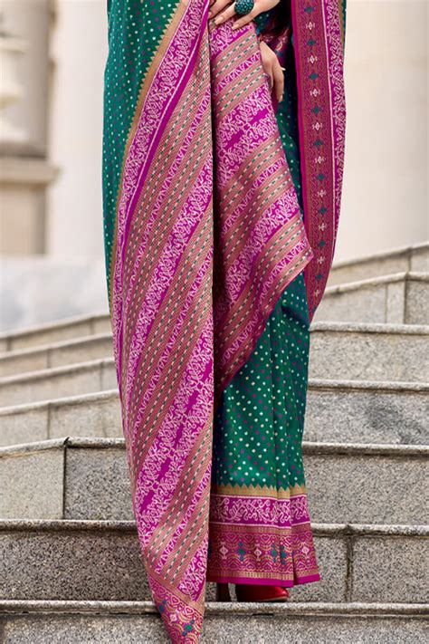 Twirling Dark Green Patola Silk Saree with Confounding Blouse Piece ...